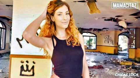 Shona River curly Hungarian redhead in black top seductive pose