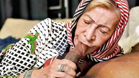 77-year-old white granny in hijab sucking big black cock