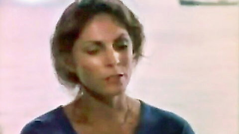 Vintage 1980s brunette in blue top from Taboo 1 porn video thumbnail