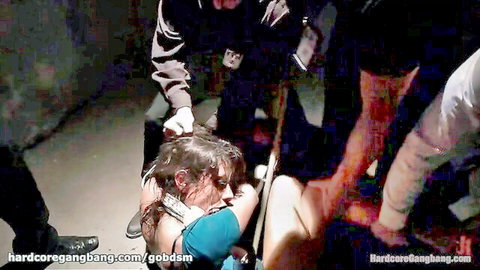 Defiant brunette in rough gangbang punishment by multiple men