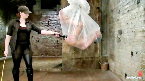 Claire dominates Tia Ling in plastic bag bondage with cattle prod torment