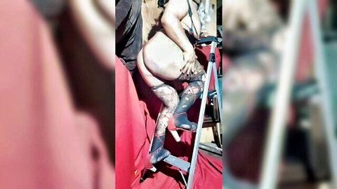 Sissy in stockings bent over showing bare ass in HD video