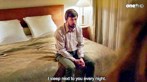Sad man in shirt on bed, emotional scene from Silke Bodenbender's Königin der Nacht (2017)