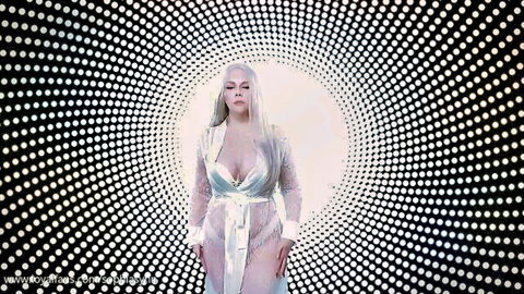 Blonde bombshell with huge tits in sheer open robe teasing solo in hypnotic glowing light