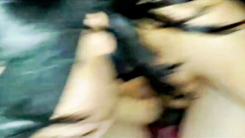 Blurry POV of young Latina deepthroating big cock with hand on her head and eyes looking up.