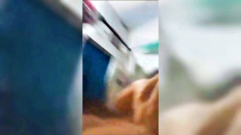 Blurry collage of car interior with flesh-toned nude body hints