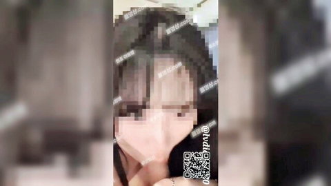 Blurry close-up of young Korean woman in white top, teasing smile