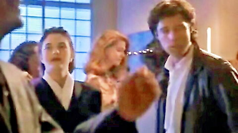 Drew Barrymore with redhead and Asian women in dresses at gathering