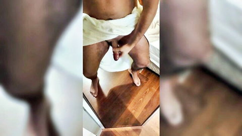 Ebony man masturbating with towel pulled down in solo HD video