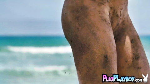 Perfect ass European MILF posed naked on sunny beach