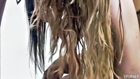 Blonde amateur woman nude side view in steamy scene