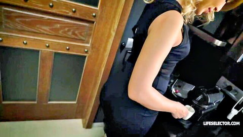 Blonde Cherry Kiss in tight black dress, teasing side view