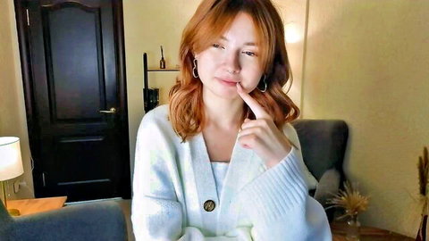 Robert Richardss redhead skinny 18yo in white cardigan, thoughtful pose