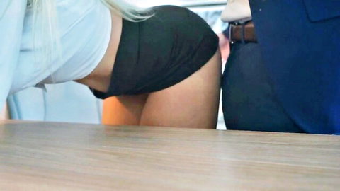 Blonde bimbo secretary with huge tits bends over desk, boss gropes her at work