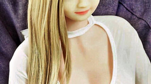 Blonde teen with huge breasts in sexy white top, teasing cleavage