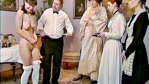 Nude brunette in white stockings with garters in Victorian fetish group orgy scene