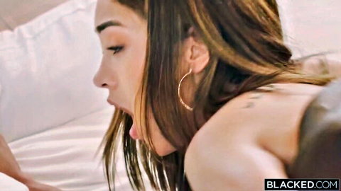 Sonya Blaze giving intense blowjob in Blacked interracial scene