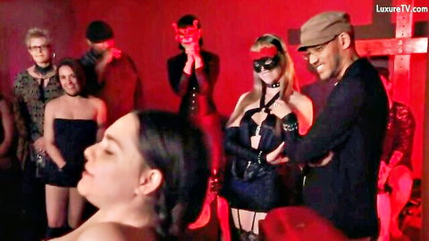 BDSM group scene in Mood Pictures Milgram Experiment 2, masked women in harnesses