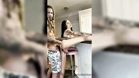 Kyliestixxx tattooed with dreadlocked black stud in explicit pose