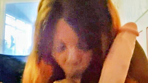 Ebony woman with blonde hair open mouth teasing huge veiny dildo blowjob closeup