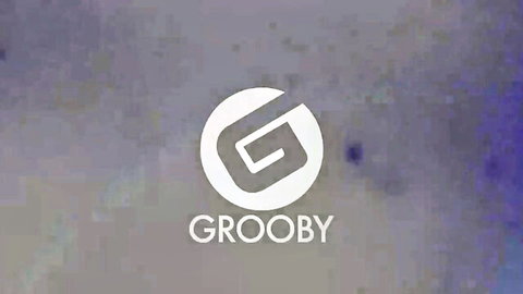 Grooby trans porn studio logo with stylized G on purple background