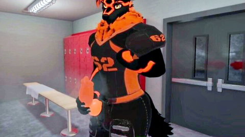 Muscular orange furry football jock gripping huge orange dildo in locker room