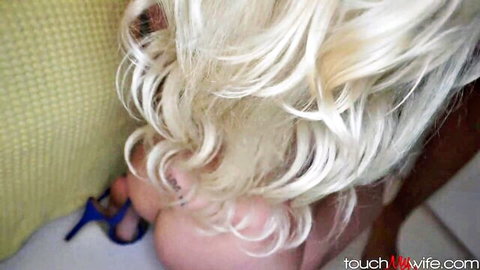 Dixie Lynn blonde with curly hair showing bare ass in blue heels