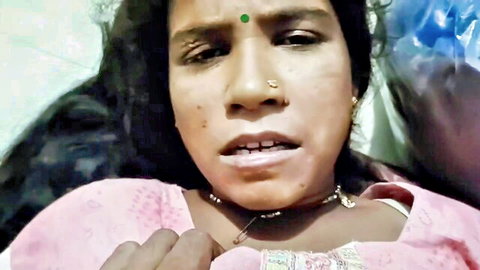 Indian Bhabhi in pink saree with intense aroused expression