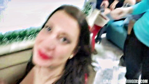 Brunette swinger smiling in amateur home video thumbnail