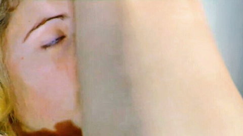 Sensual close-up of blonde Rachel from HairyErotica, eyes half-closed in ecstasy