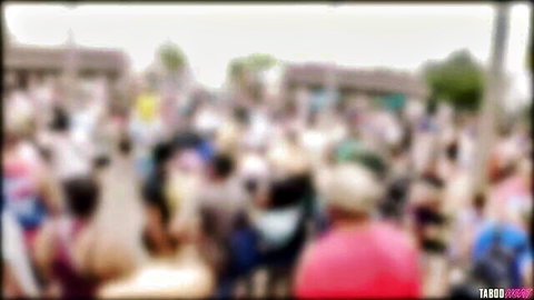 Two MILFs in outdoor threesome with young guy in crowded park