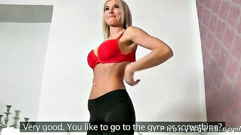 Slender blonde amateur in red bra posing at casting with large boobs