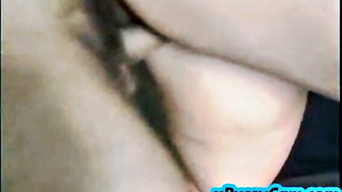 Blurry close-up of mature woman's exposed cleavage in older MILF video