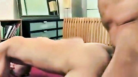 Nude Asian woman bent over in doggy style position during intense sex