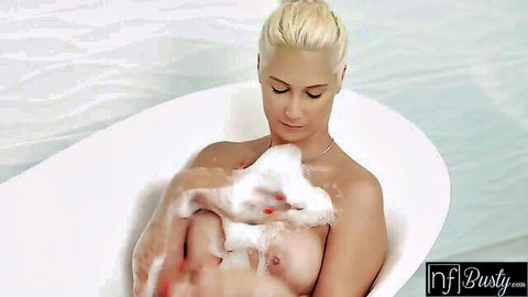 Busty Sharon White nude in foamy bathtime fun