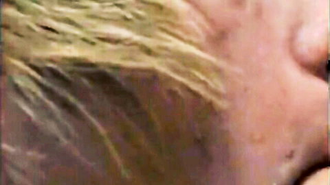 Blonde woman close-up face in adult video thumbnail