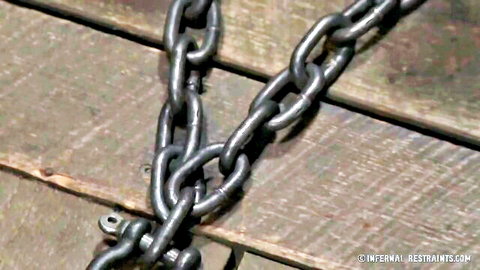 Bound chains tease blonde slave's fear and lust in waiting game