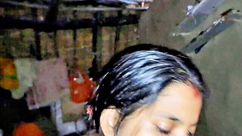 Sexy Desi Indian housewife with wet black hair and sindoor in homemade clip
