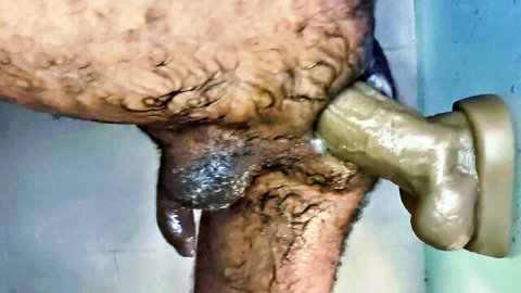 Hairy mature man enjoying massive wall-mounted dildo deep anal insertion