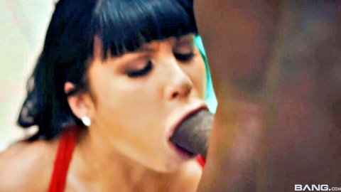 Brunette with bangs deepthroats thick black cock in intense interracial blowjob