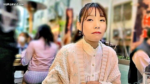 Yurufuwa beauty Miss Menes in pink cardigan and white blouse, serious gaze