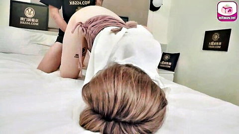 Asian step-sister in doggy position with partner on bed