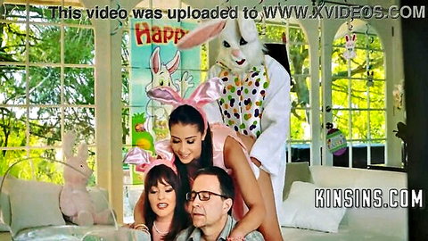 Avi Love in pink bunny costume fucked doggy style during family Easter photo