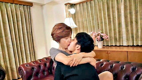 Miyako Hori passionately kissing young lover in intimate embrace