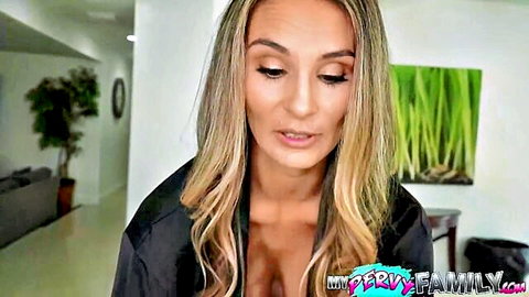 Mandy Rhea blonde MILF in open black robe showing deep cleavage