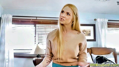 Sexy blonde busty stepmom Sarah Vandella gesturing in sweater