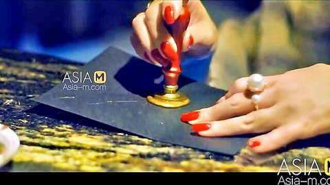 Su Yu Tang's elegant hand with red nails stamping gold seal in ModelMedia Asia porn
