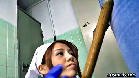 Maki Koizumi in nurse uniform giving uncensored blowjob