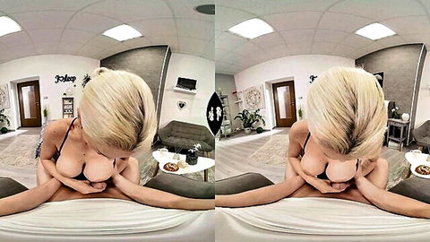 Blonde babe with big tits topless teasing in POV on bed