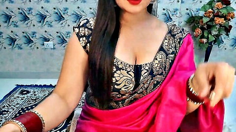 Mahimagicdoll999999 in pink saree showing deep cleavage and big boobs